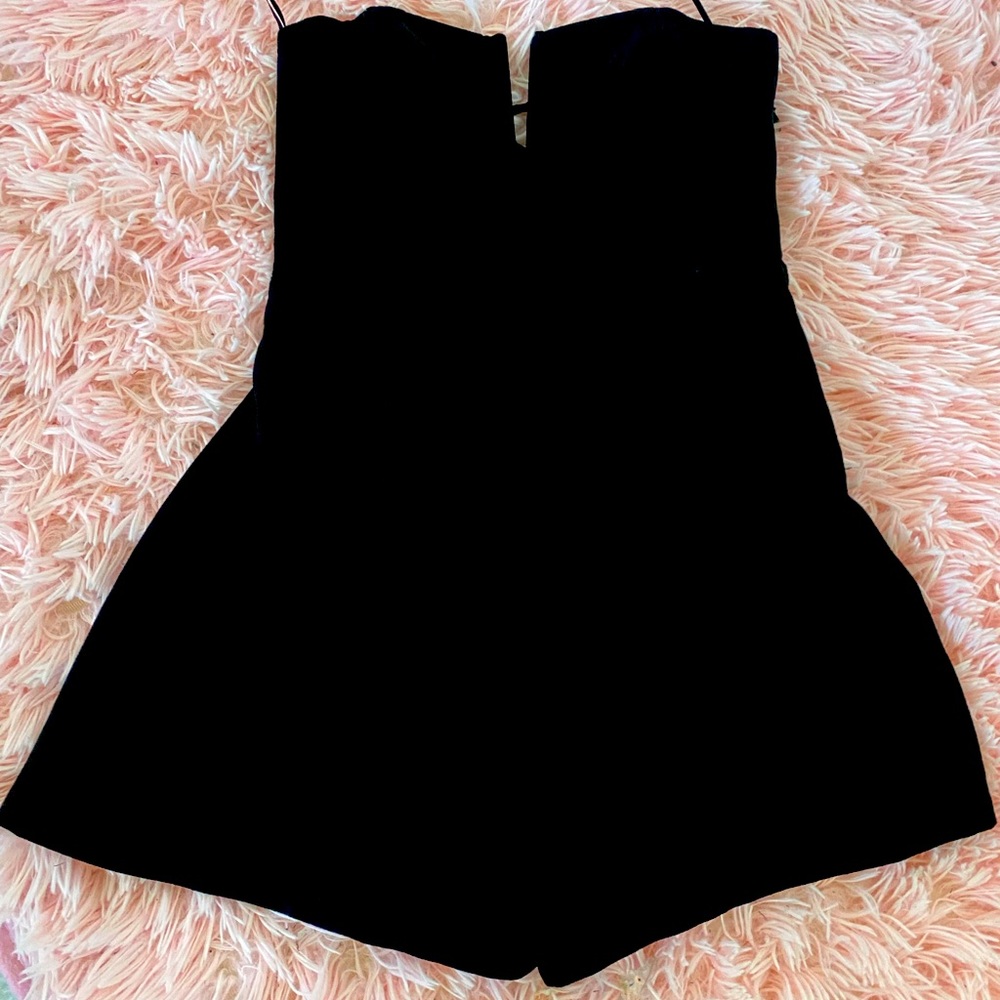 Black jumpsuit, perfect for girls night out. Never worn.